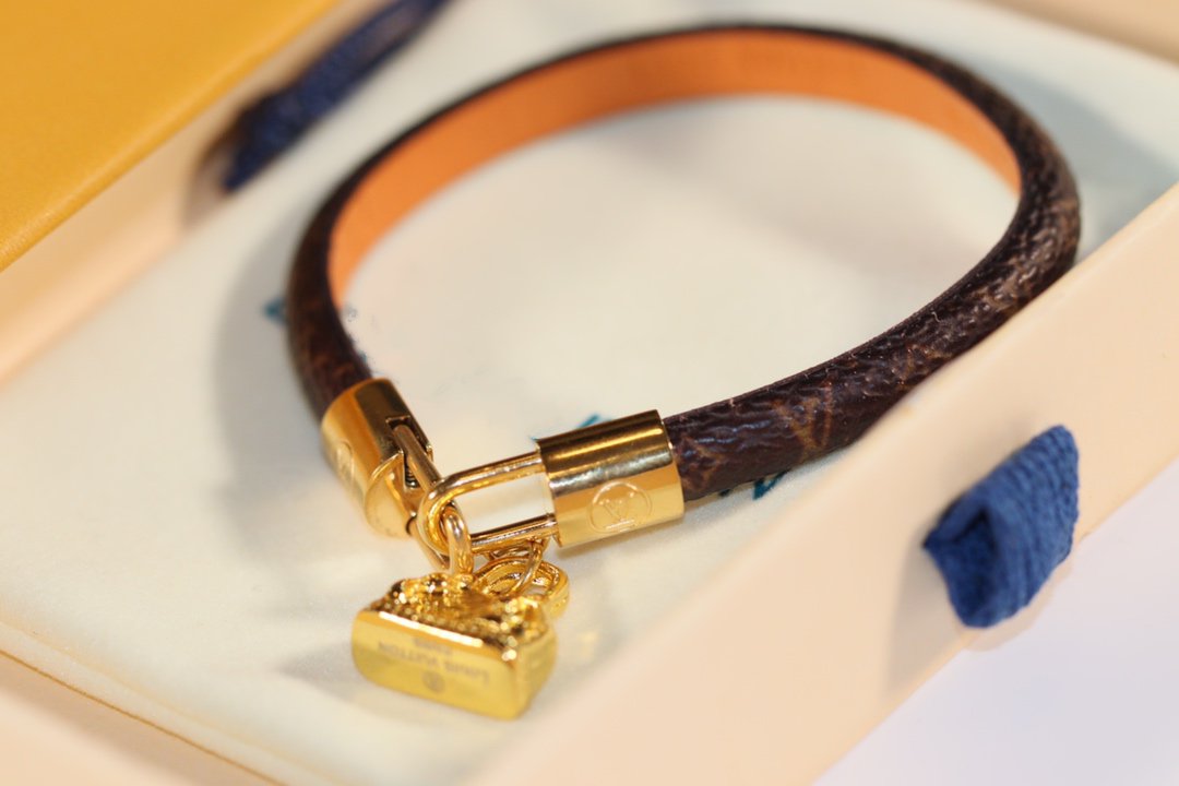 LV ALMA PINK GOLD CANVAS