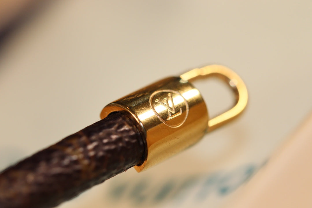 LV ALMA PINK GOLD CANVAS