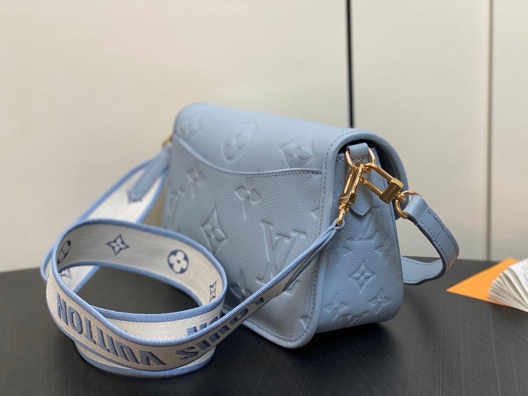 diane 24 light blue monogram empreinte leather