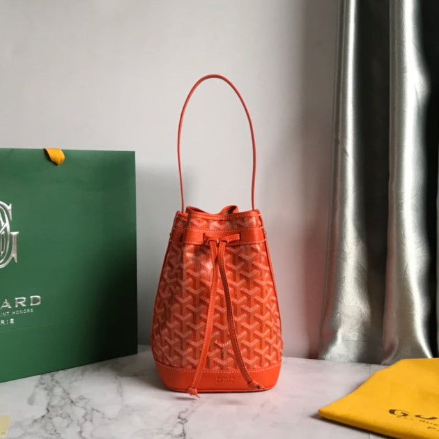 PETIT FLOT BUCKET BAG 22 IN ORANGE GOYARDINE CANVAS AND LAMBSKIN TRIM