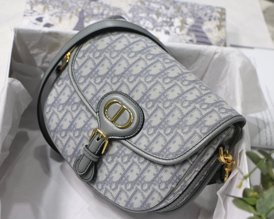 MEDIUM CD BOBBY 22CM GREY OBLIQUE CANVAS GOLD HARDWARE