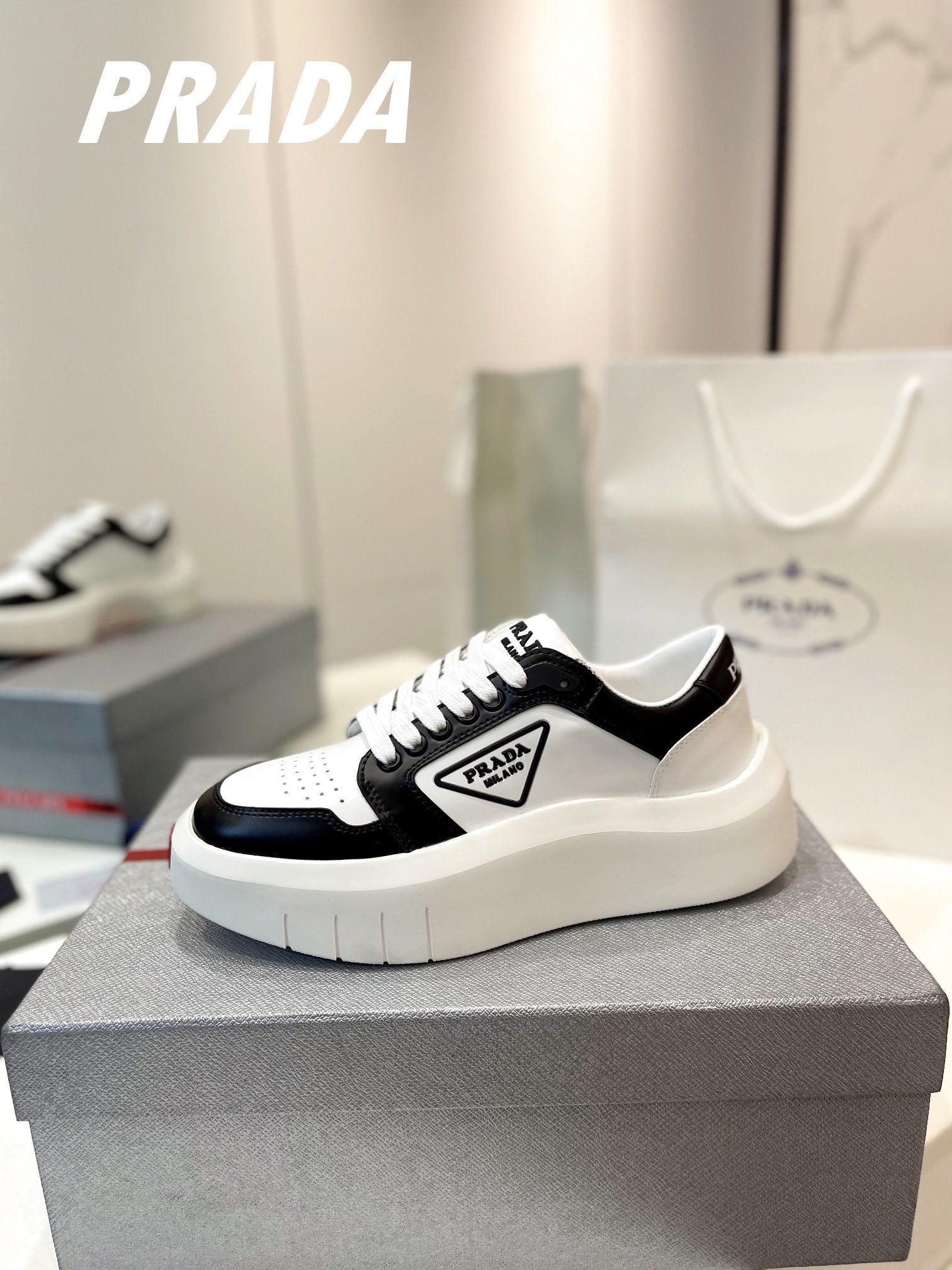 PRA DOWNTOWN THICK-SOLE SNEAKERS BLACK AND WHITE CALFSKIN