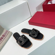 Vlogo Cut-Out Black Calfskin Slide Sandal