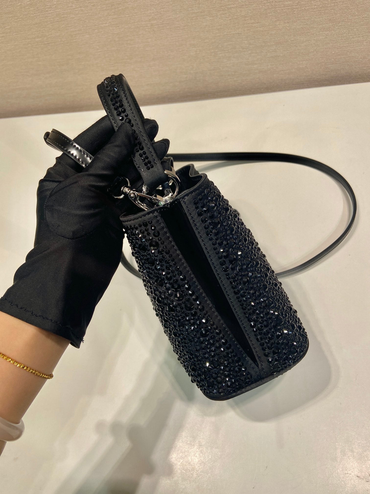 PANIER BUCKET BAG 16 IN BLACK CALFSKIN ATTACHED FULL CRYSTALS