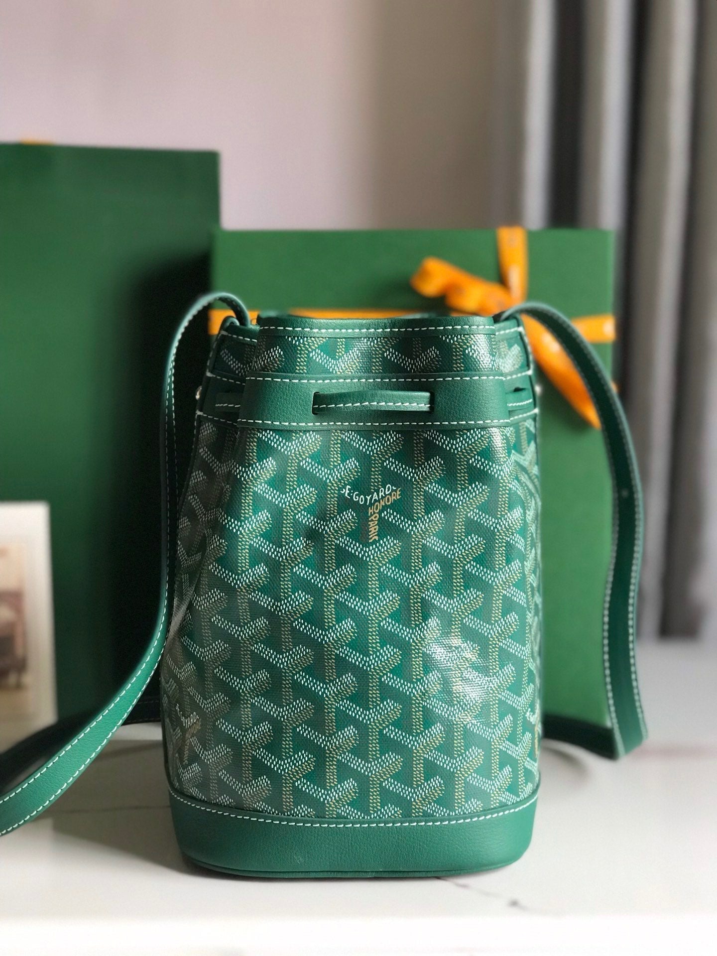 PETIT FLOT BUCKET BAG 22 IN GREEN GOYARDINE CANVAS AND LAMBSKIN TRIM