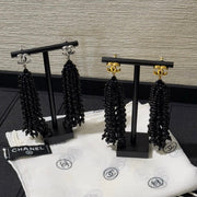 Chanel 2026 Black Beaded Tassel Earrings with Gold Double C Long Earrings