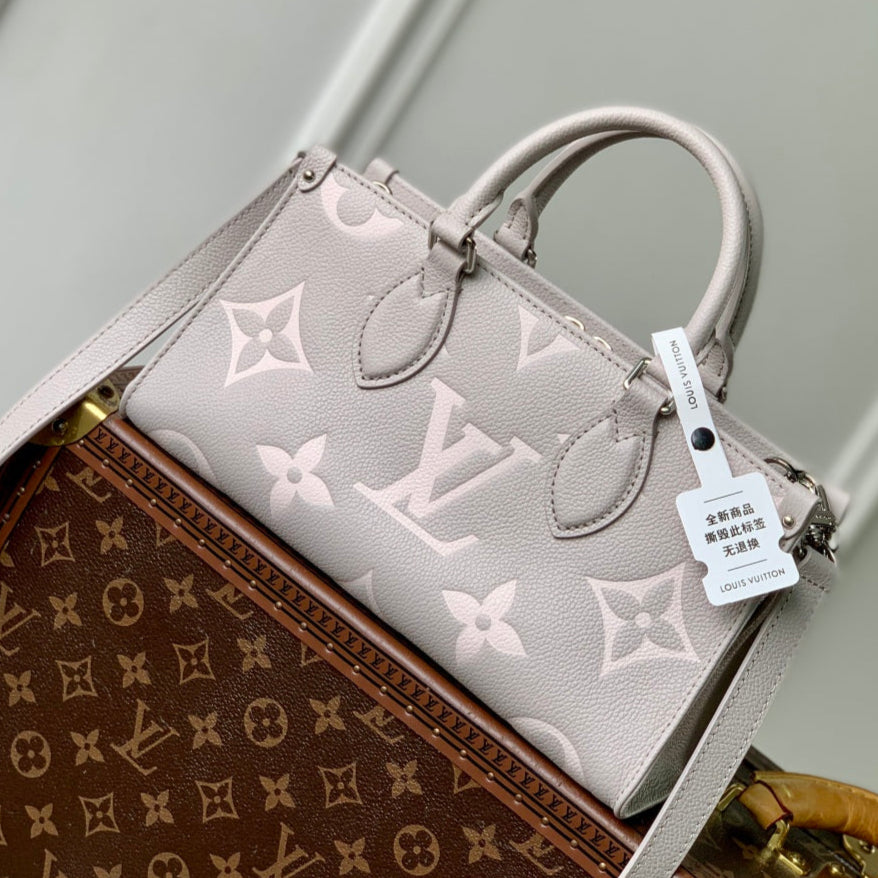 LV OnTheGo East West Bag Gray White Monogram Empreinte leather 240824
