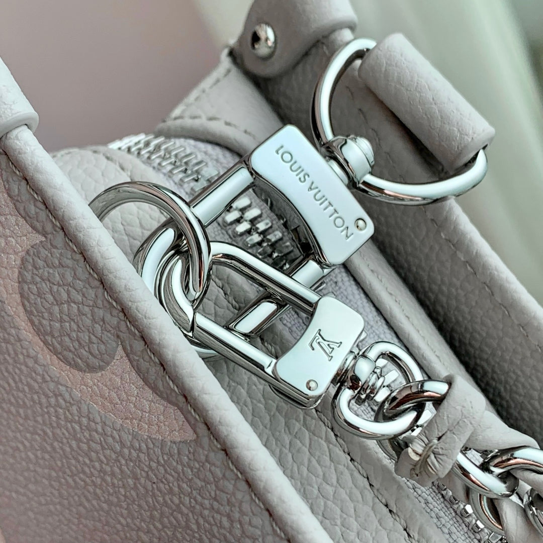 LV OnTheGo East West Bag Gray White Monogram Empreinte leather 240824