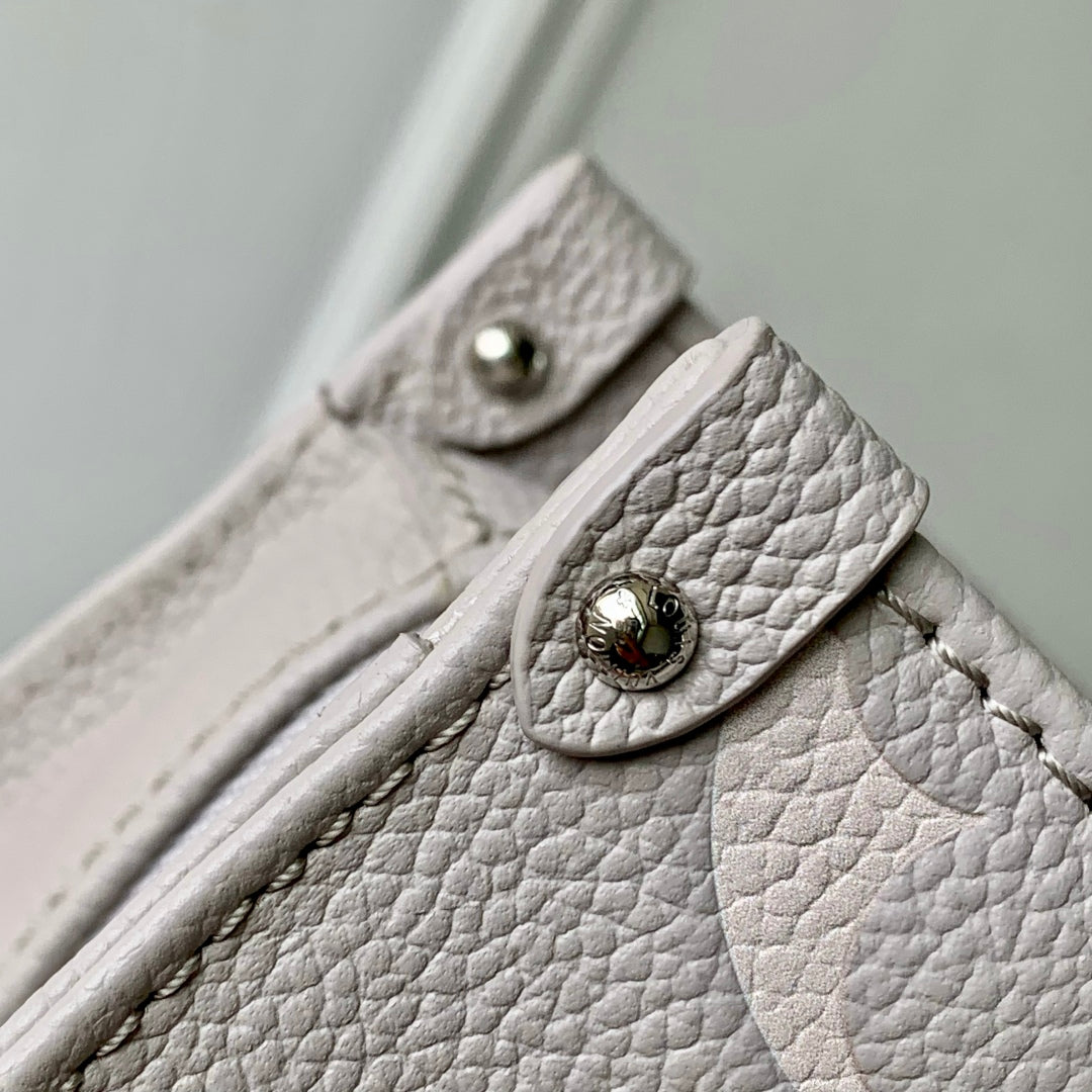 LV OnTheGo East West Bag Gray White Monogram Empreinte leather 240824