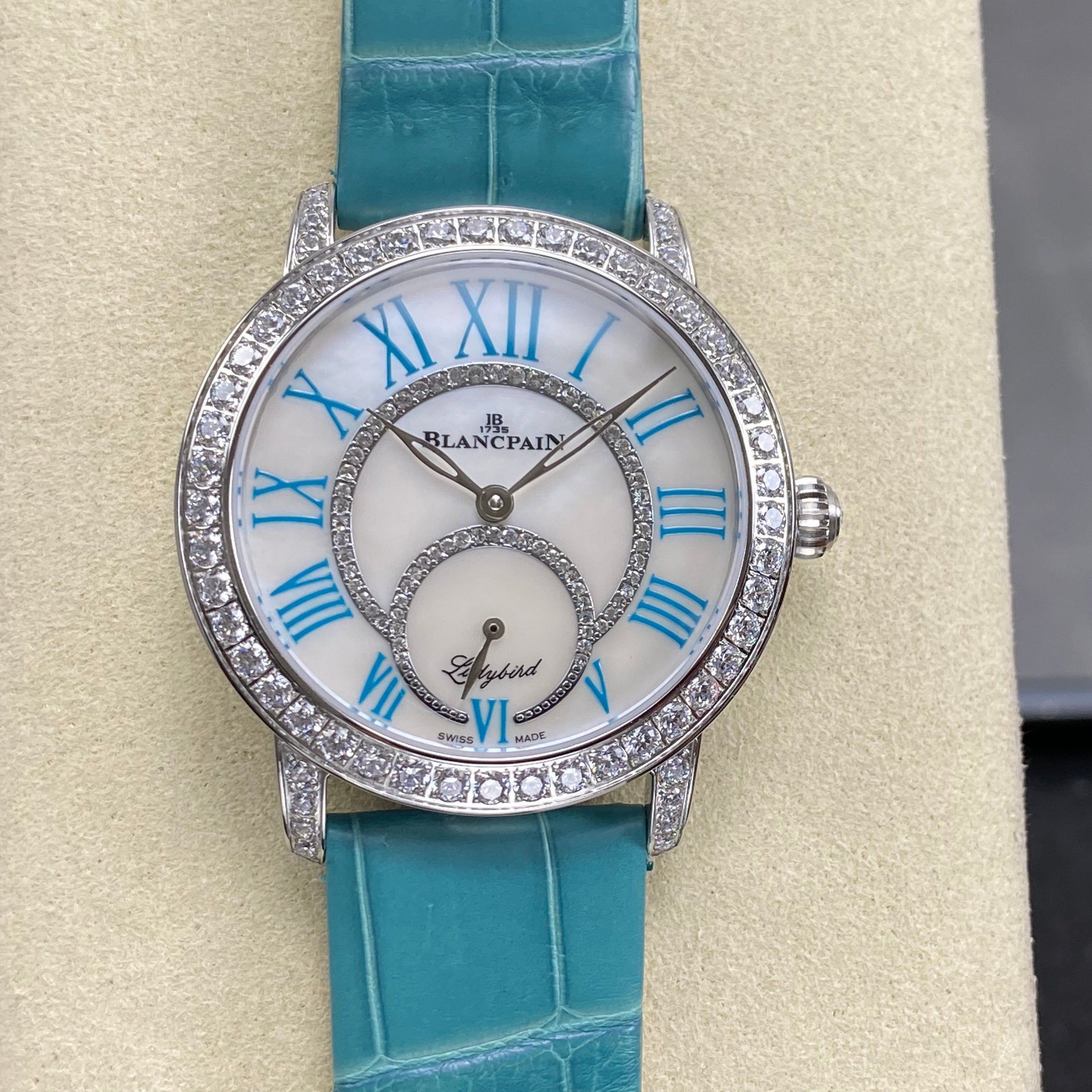 Blancpain's Ladybird 35mm White Blue Dial Diamond Bezel Leather
