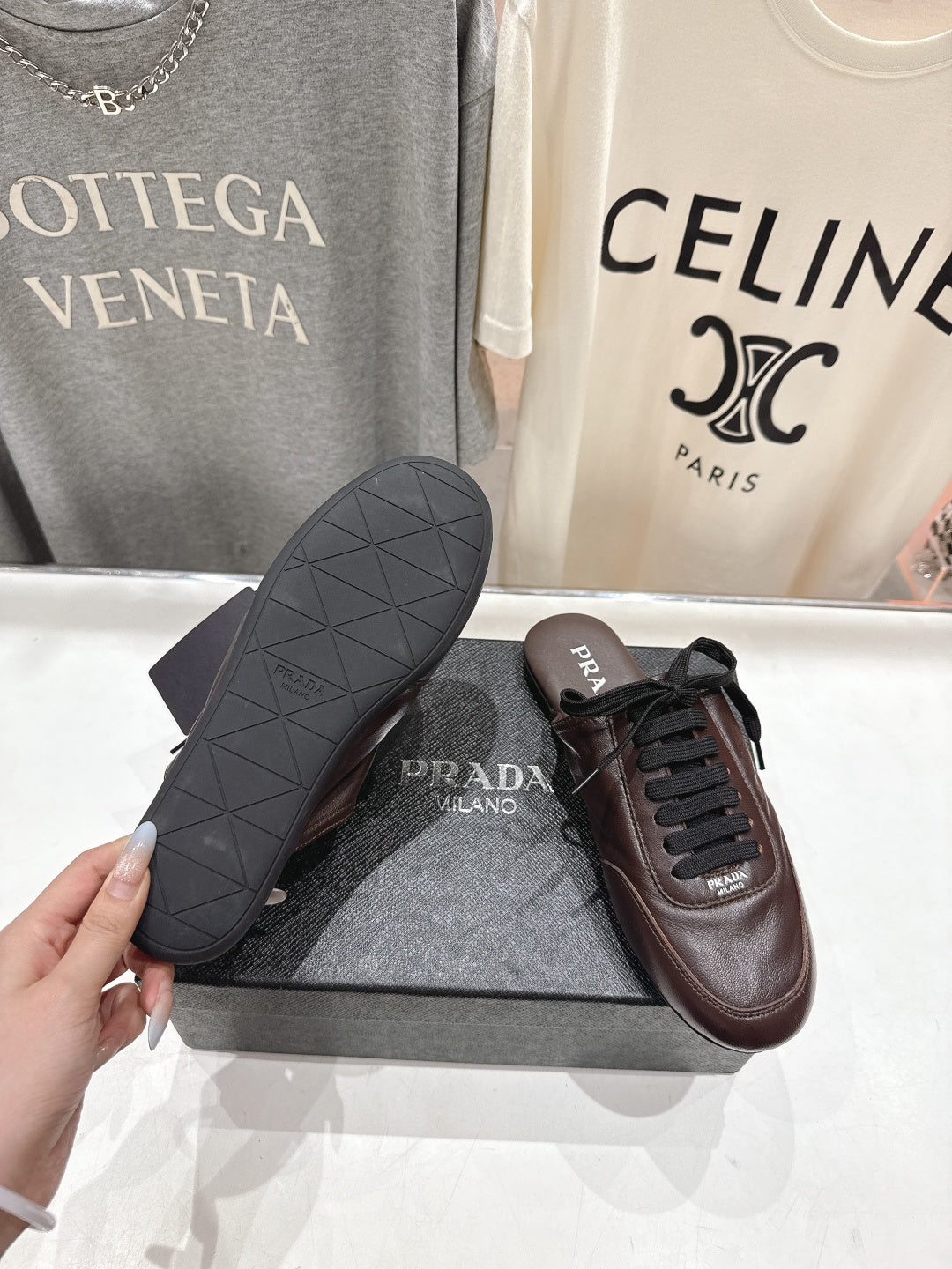 Prada 25s mule dark brown sheepskin 535501