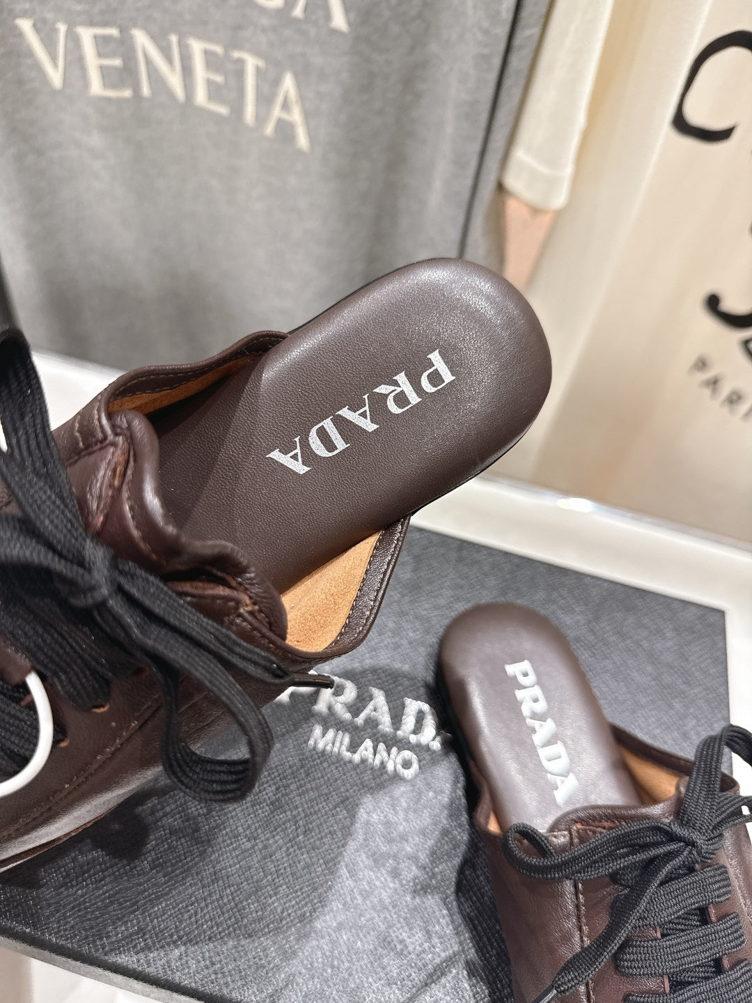 Prada 25s mule dark brown sheepskin 535501