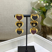 Chanel 2026 Gold Double C Black Heart Enamel Long Stud Earrings