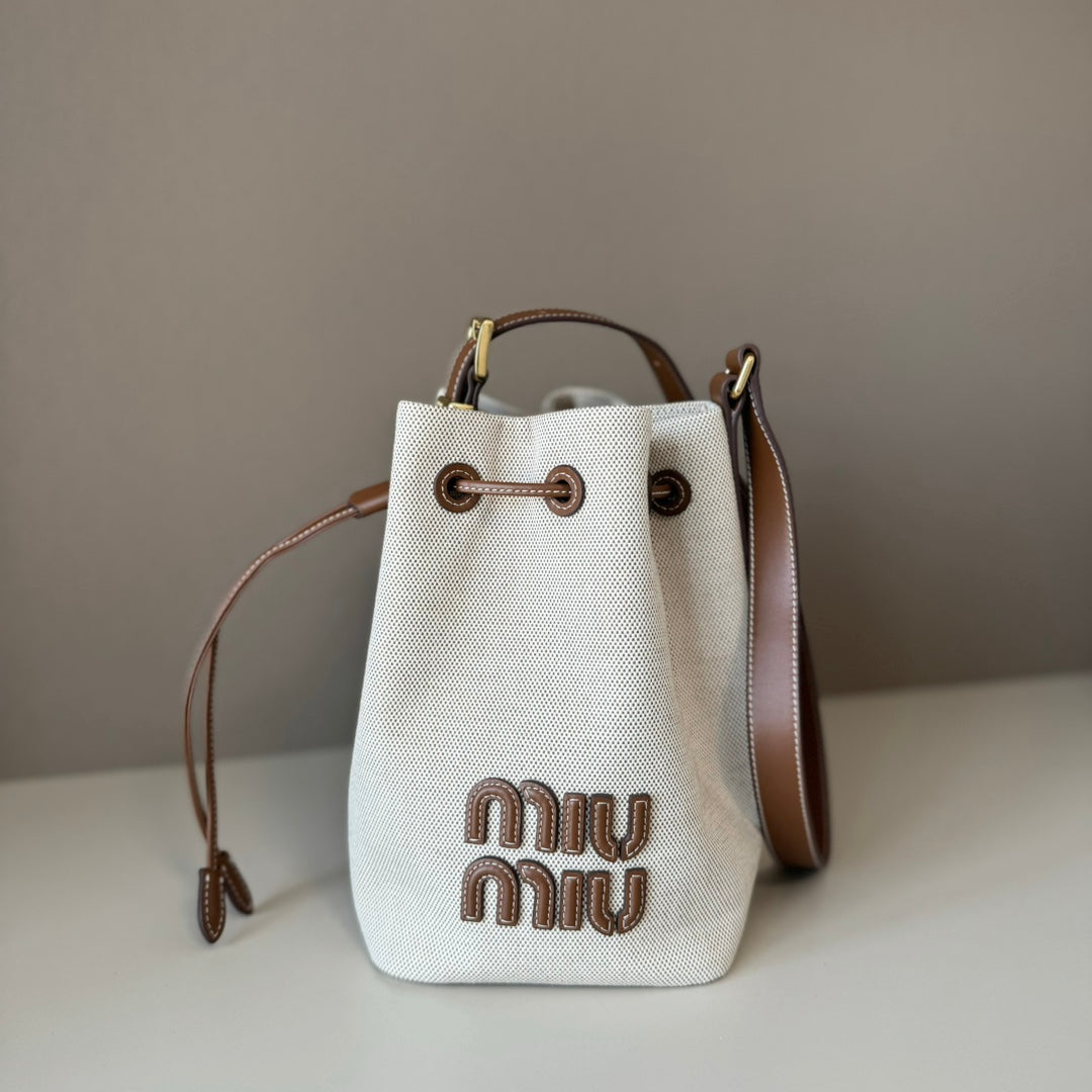 MiuMiu bucket bag white brown denim