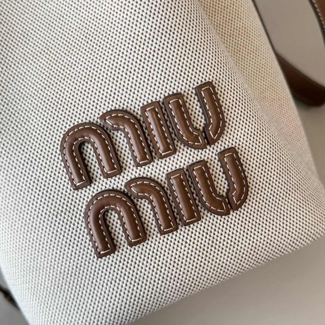 MiuMiu bucket bag white brown denim