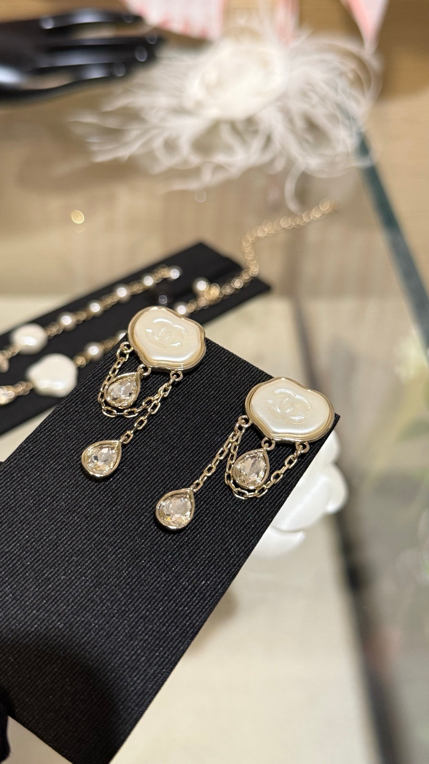Chanel  Cloud Double C Resin Double Teardrop Crystal Light Gold Chain Tassel Earrings