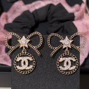 Chanel Light Gold Earrings With Bow Rhinestones And Stars