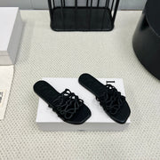Loewe 25 Petal Anagram Slides Black Cowhide