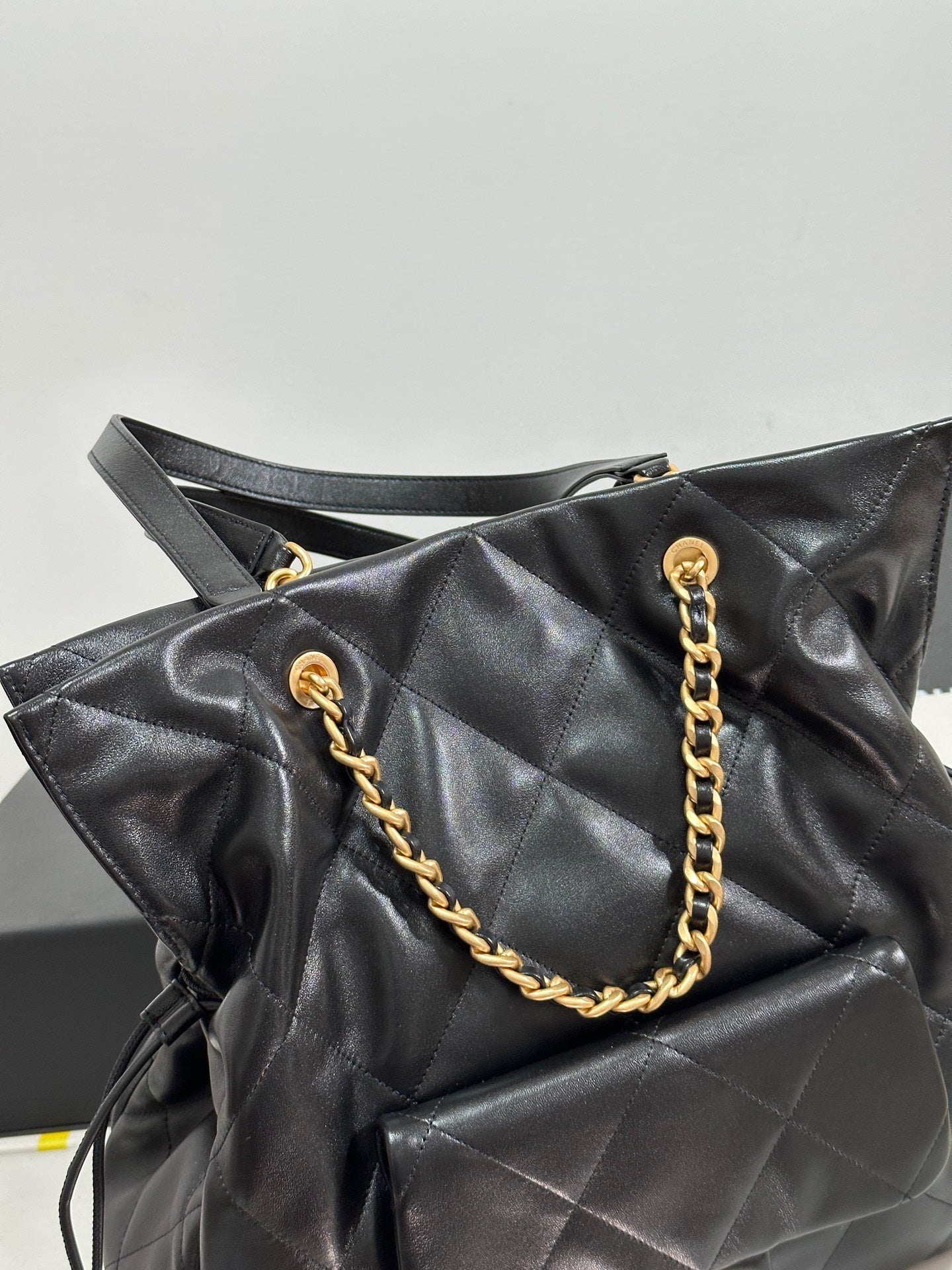 CC 25C Drawstring Backpack Black Lambskin Gold Hardware 243655