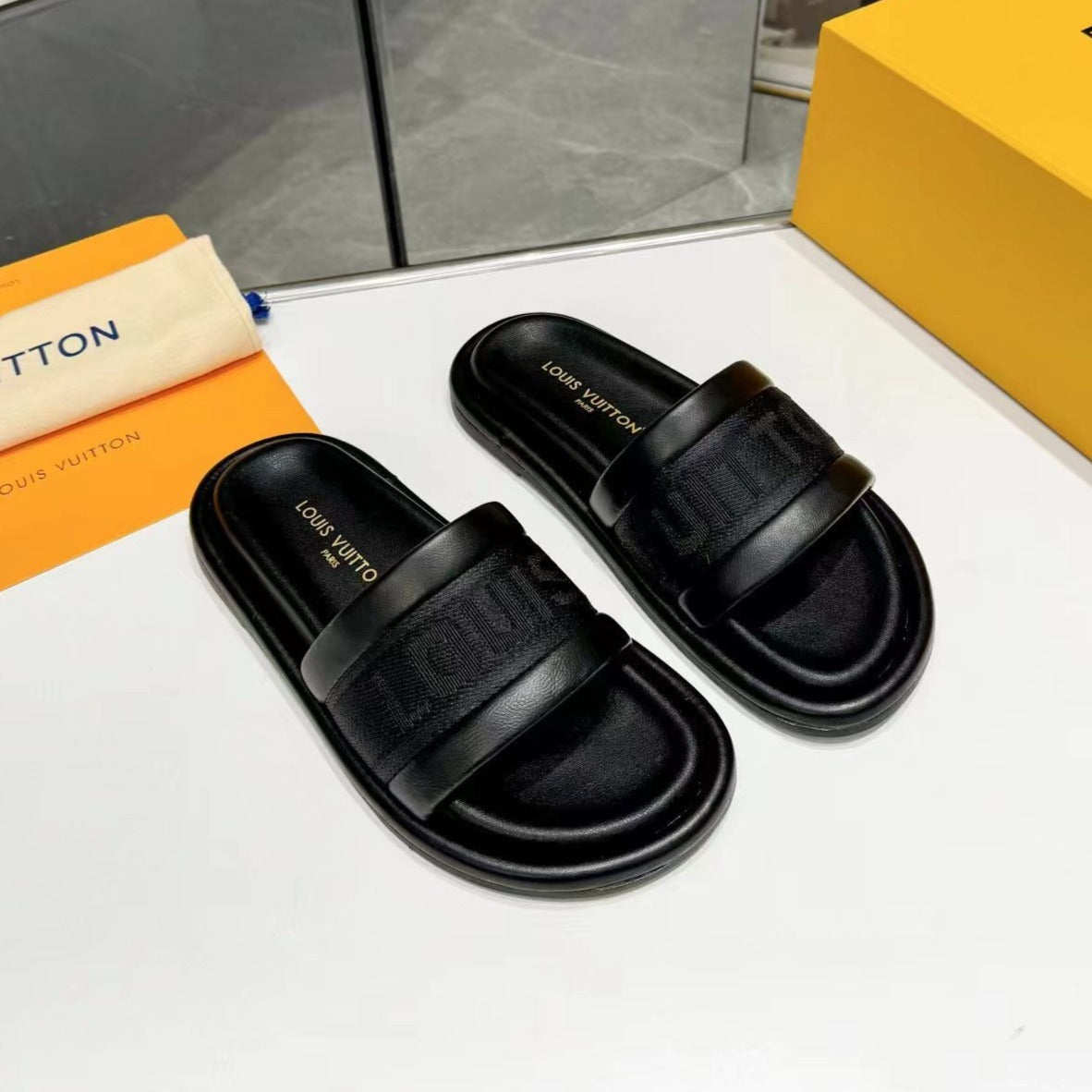 lv bliss flat mule black canvas calfskin