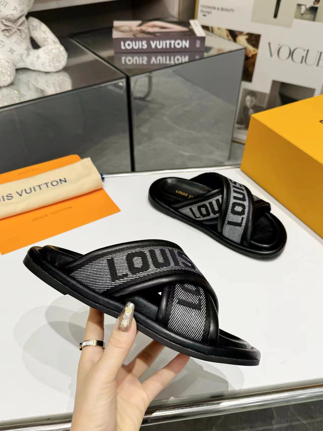 lv bliss cross sandal mule black textile calfskin