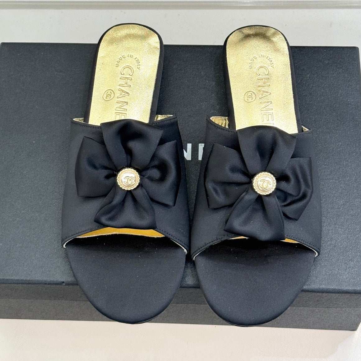 CC 26 Bow Flat Sandal Black Gold Satin Sheepskin 609799