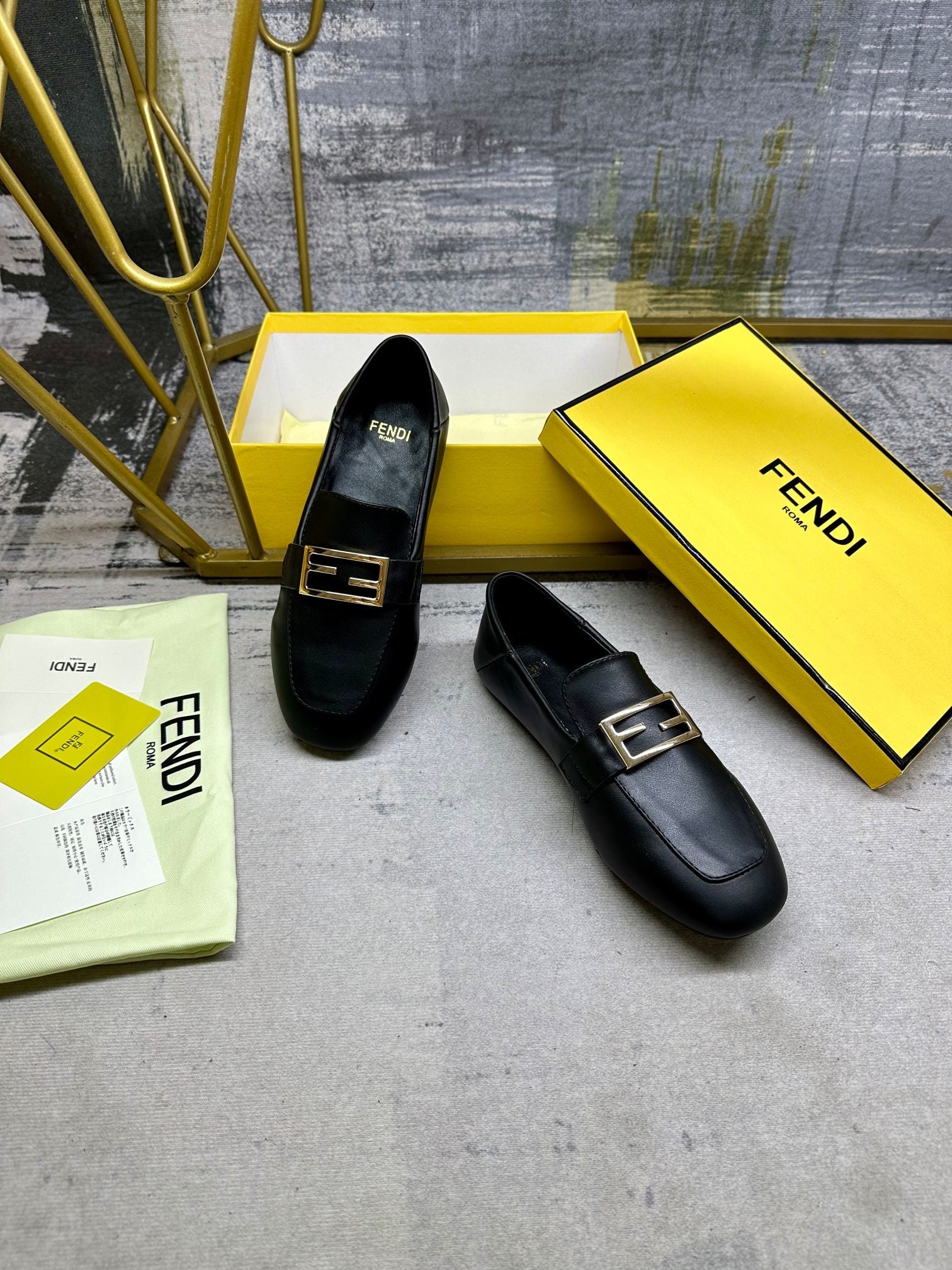 FENDI LOAFERS IN BLACK LAMBSKIN GOLD BUCKLE