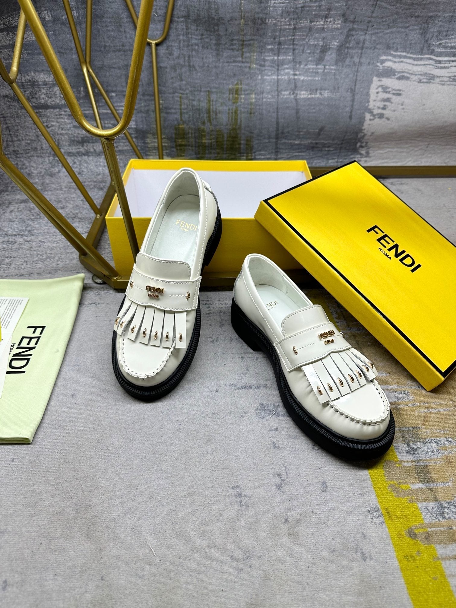 FENDI BAGUETTE LOAFERS IN WHITE CALFSKIN WITH GOLD HARDWARE