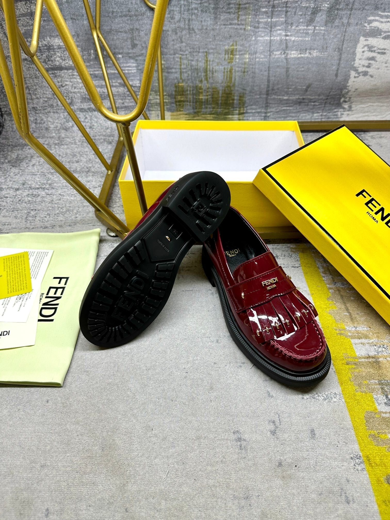 FENDI BAGUETTE LOAFERS IN MAROON RED CALFSKIN WITH GOLD HARDWARE
