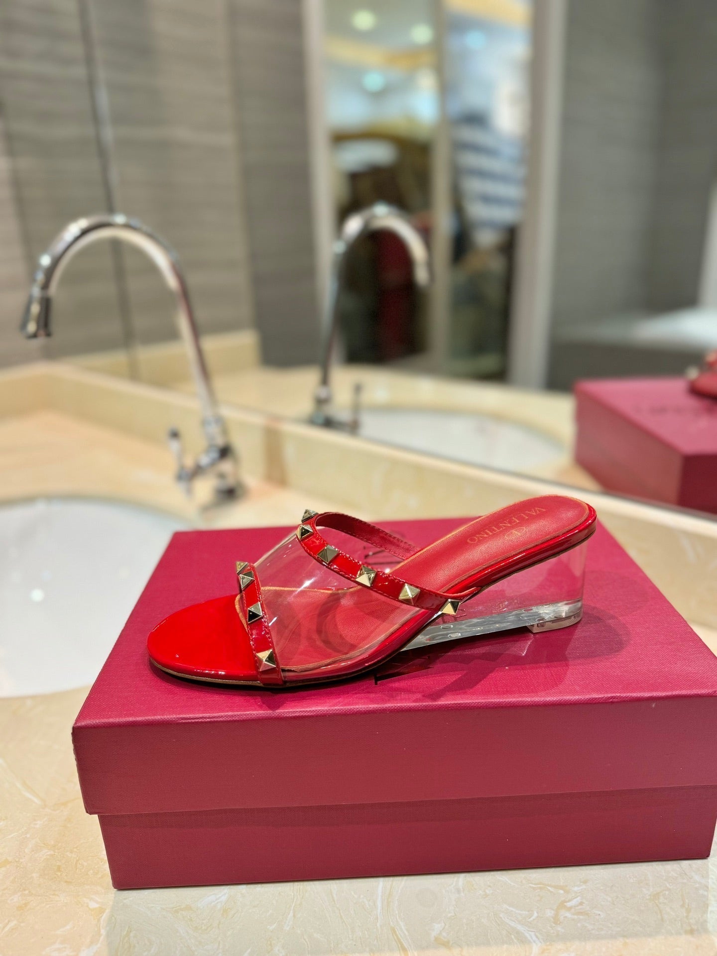 ROCKSTUD MULE SANDALS IN CHERRY RED CALFSKIN AND TRANSPARENT PVC FILM