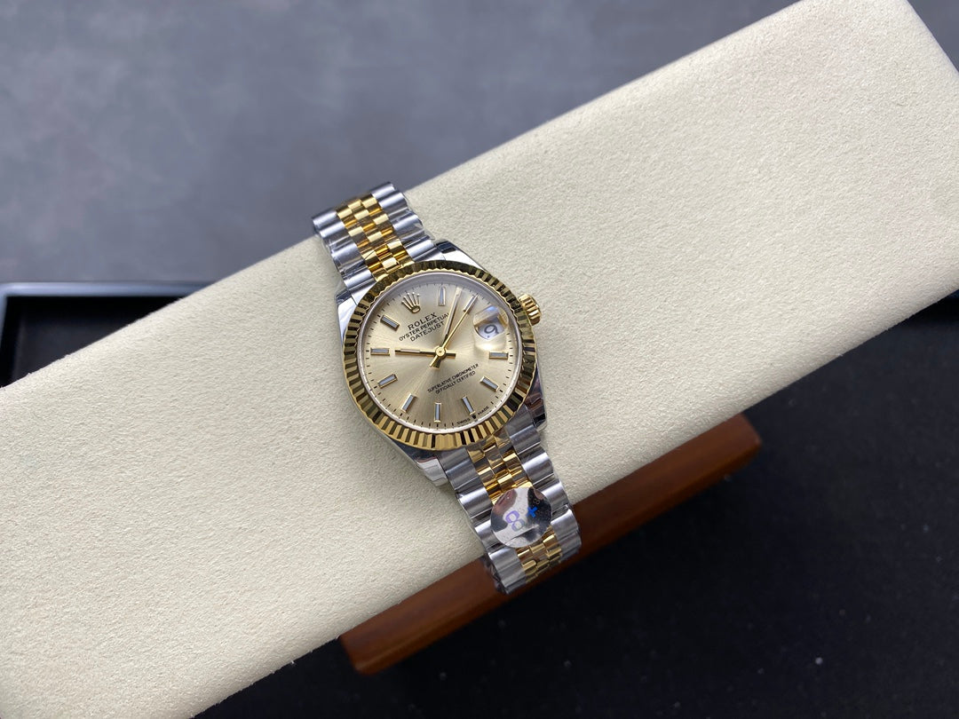 Datejust 31mm Yellow Gold Steel Champagne Dial