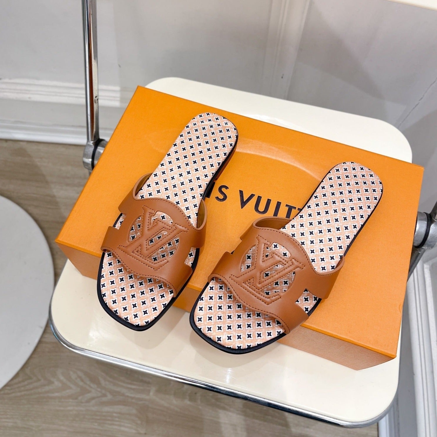 lv sandal isola flat mule brown calfskin star monogram