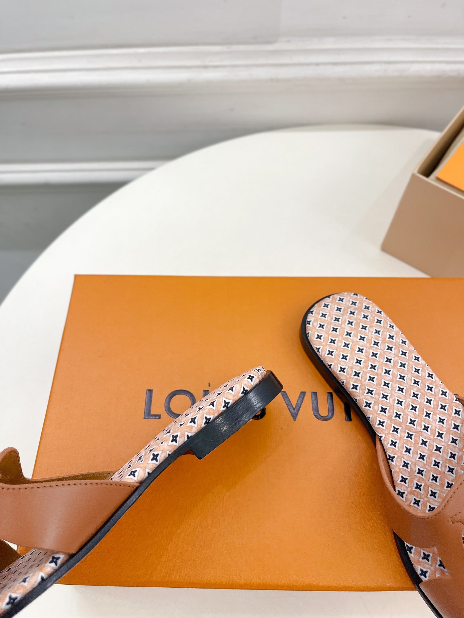 lv sandal isola flat mule brown calfskin star monogram