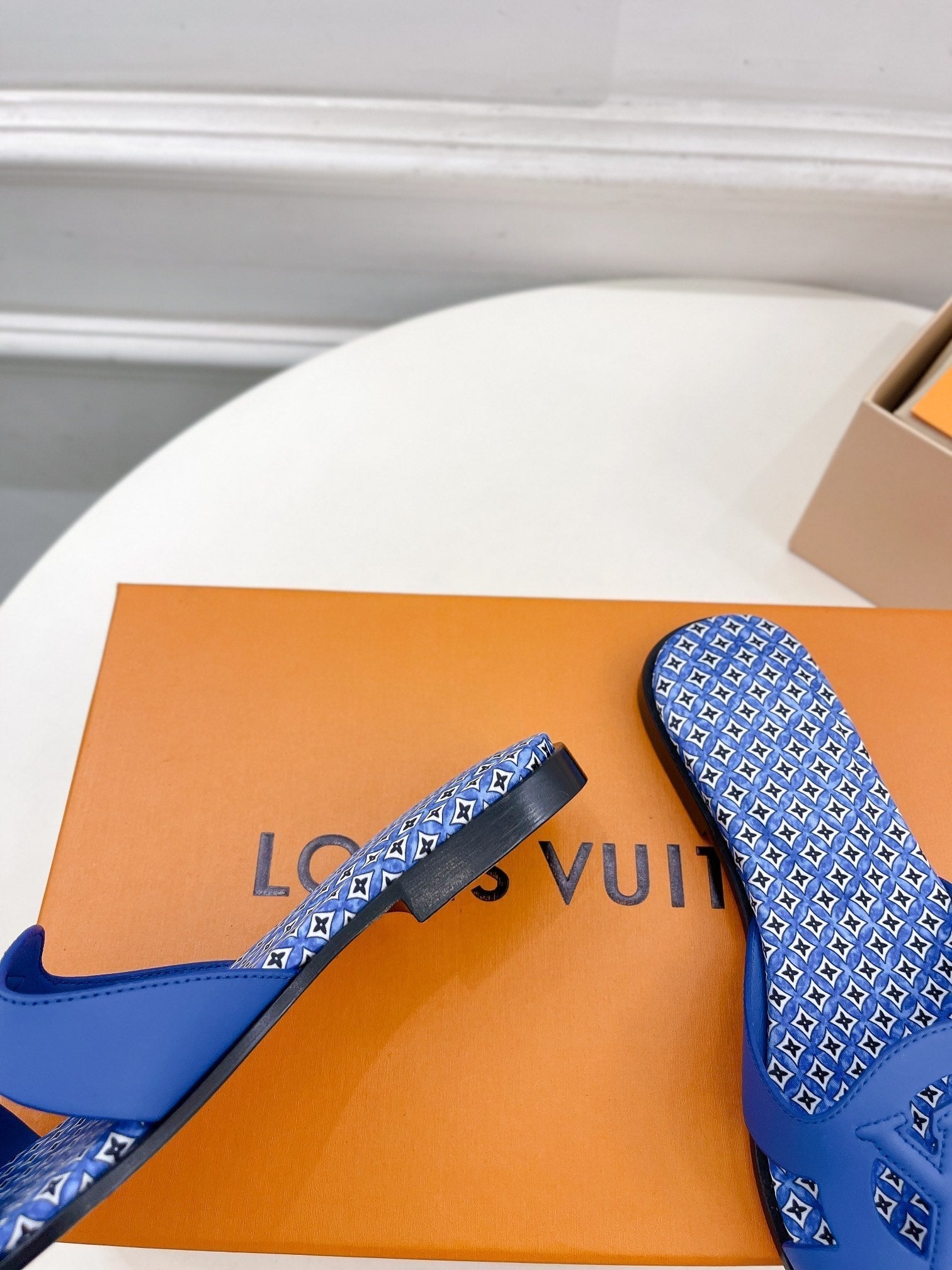 lv sandal isola flat mule blue calfskin star monogram