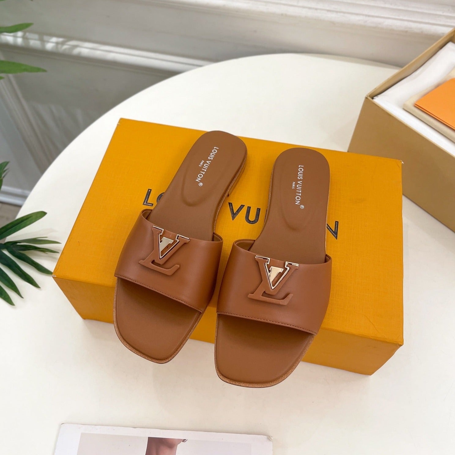lv capri flat mule dark brown calfskin