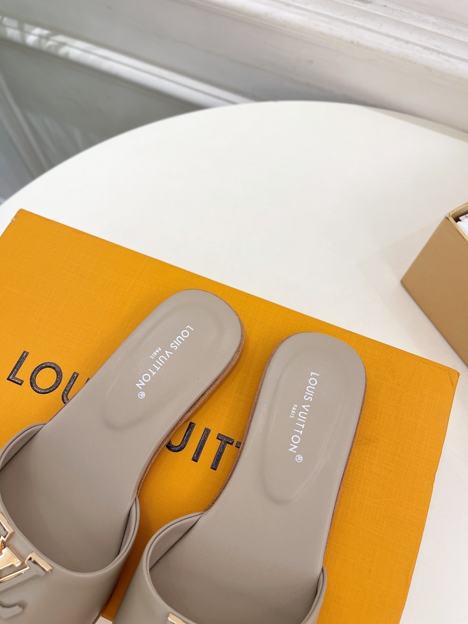 lv capri flat mule grey calfskin