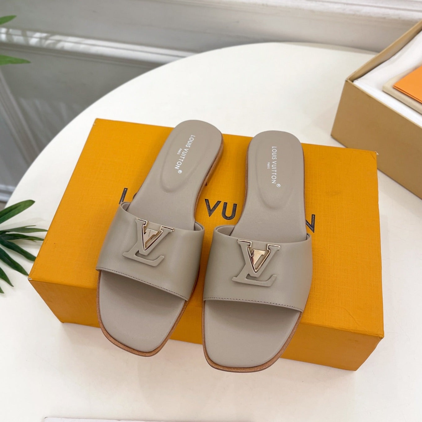 lv capri flat mule grey calfskin