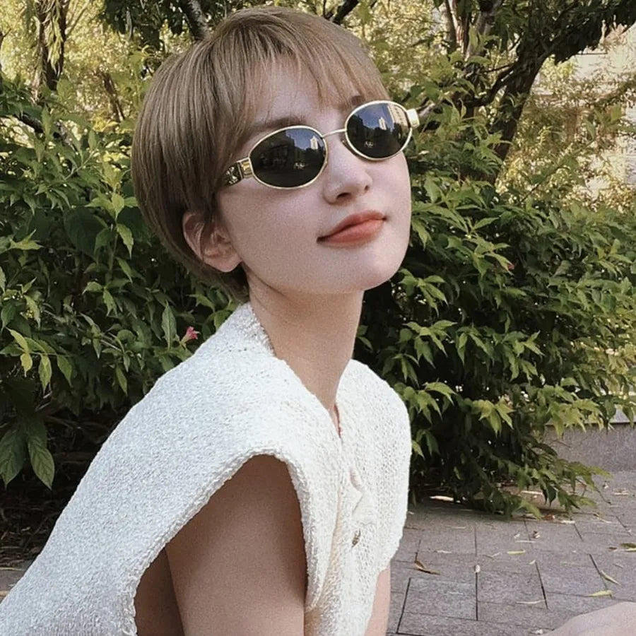 TRIOMPHE OVAL SUNGLASS  CL40240l IN METAL